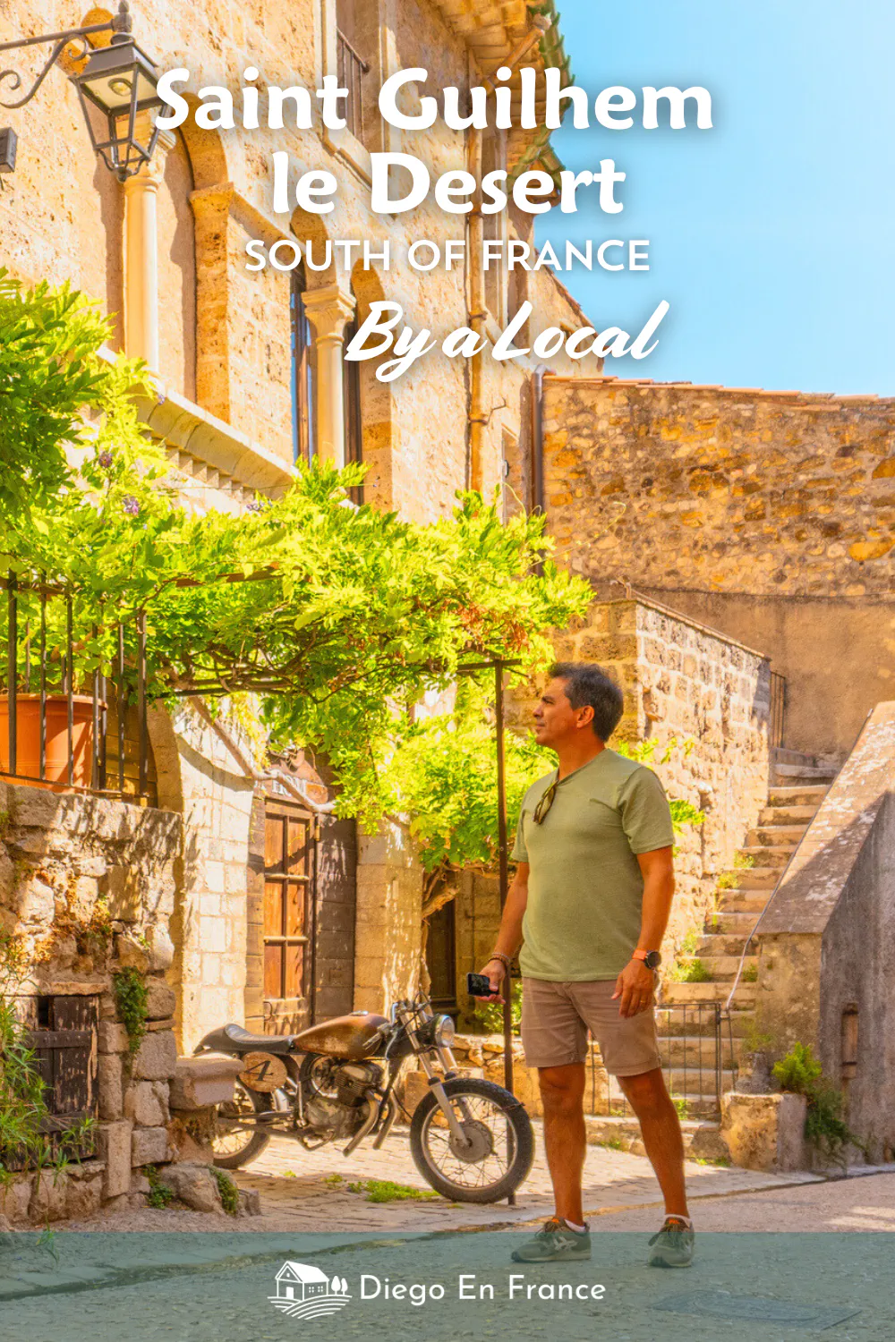 Hombre caminando por calle empedrada con casas de piedra en Saint-Guilhem-le-Désert