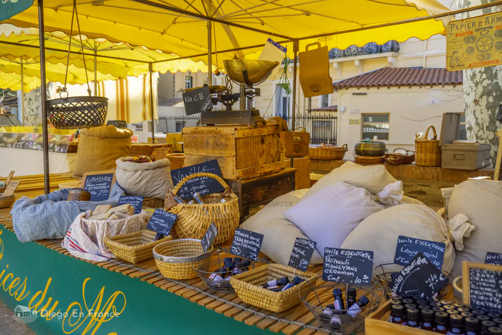 Spices and aromatic herbs stand at the Collioure market.