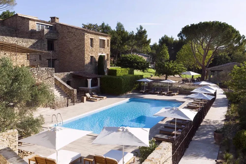 Swimming pool at Mas des Herbes Blanches, a charming luxury hotel in the Luberon Provençal area