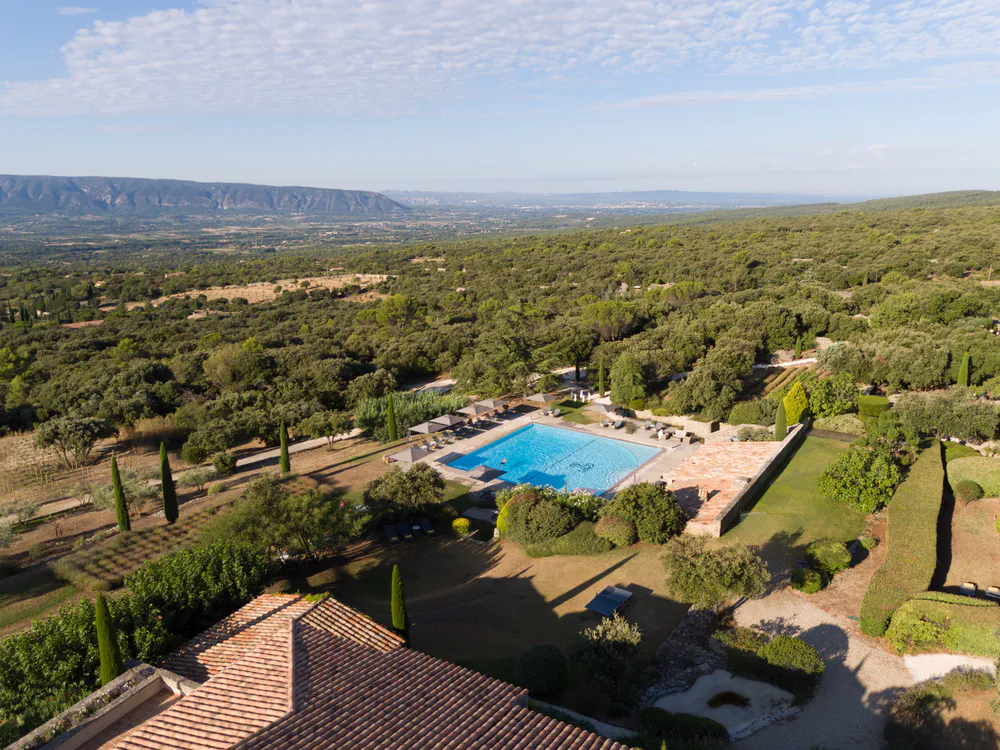 Aerial view of Les Bories & Spa in Gordes, a five-star hotel surrounded by Provençal landscape