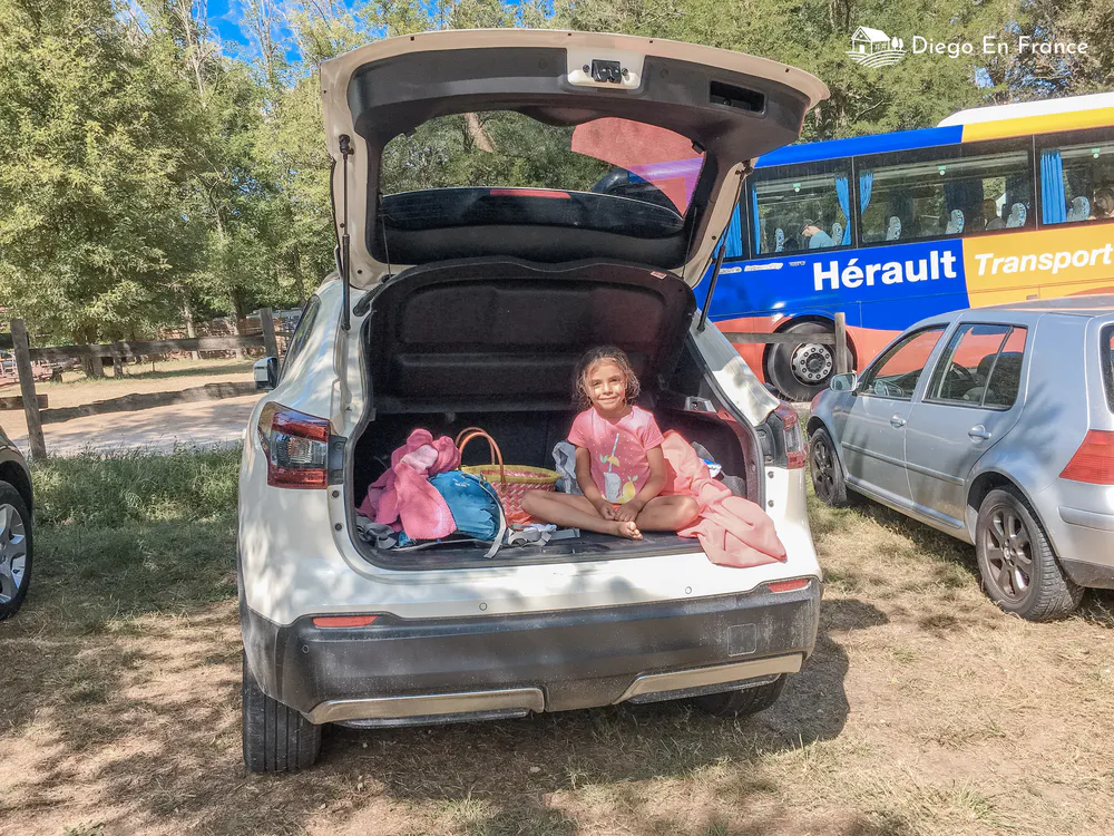 Photo from diegoenfrance.com showing a break during a family road trip, in the context of how to drive in France with kids.