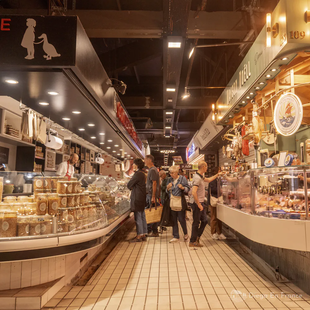 Photo from diegoenfrance.com showing the stalls at Marché Victor Hugo, ideal for a gourmet experience in Toulouse.