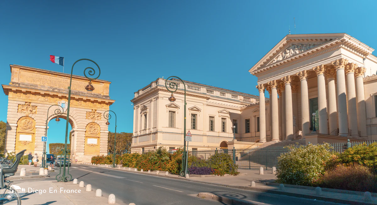 The elegant Rue Foch with the Arc de Triomphe in the background. Things to do in Montpellier