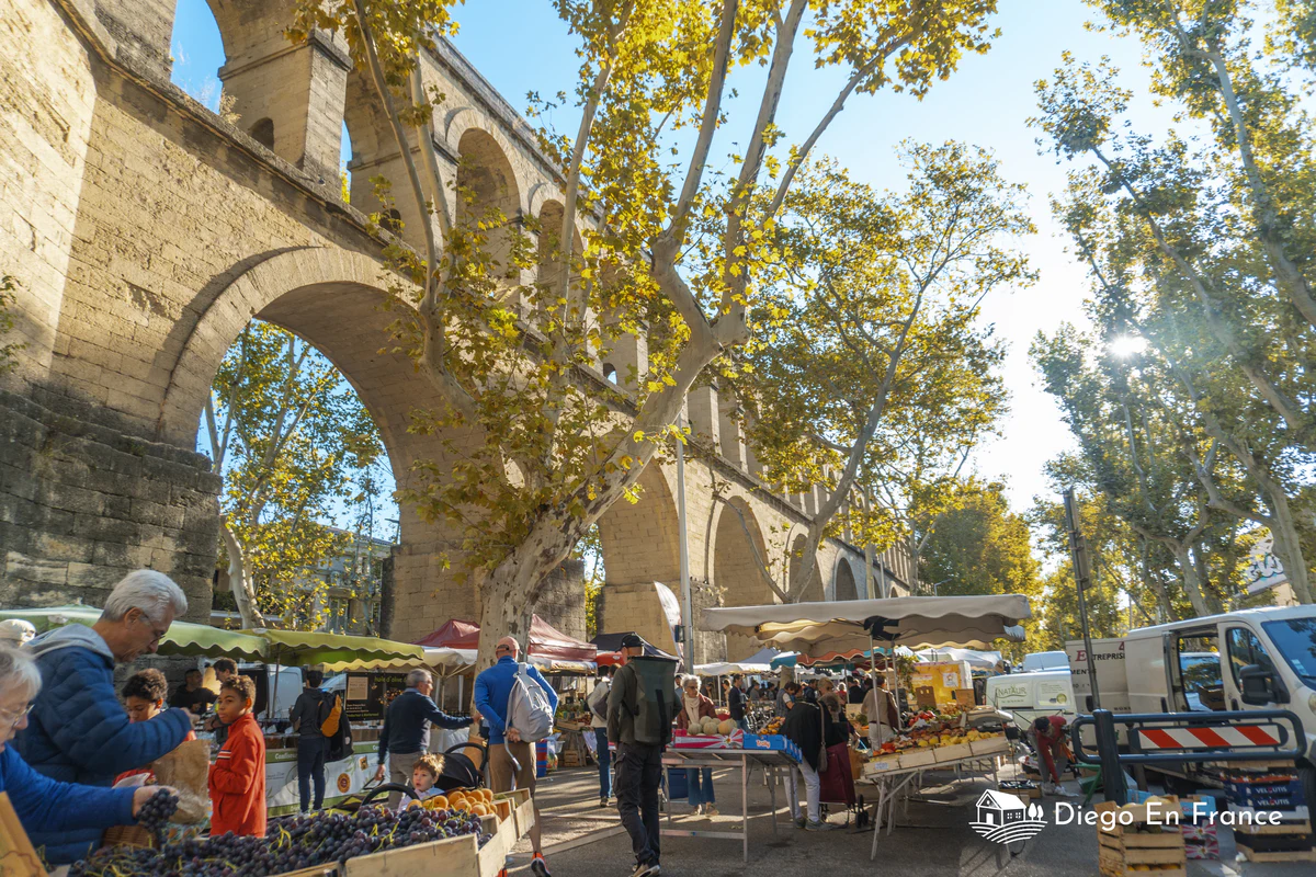 The typical Montpellier market in the arches of the aqueduct. Things to do in Montpellier